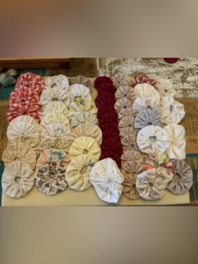 Handmade vintage Fabric Yo-Yo Quilt Pieces, total of 50!